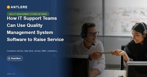 IT support team reviewing quality management system software dashboards